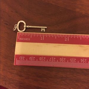 Tiffany sterling silver key pendant.